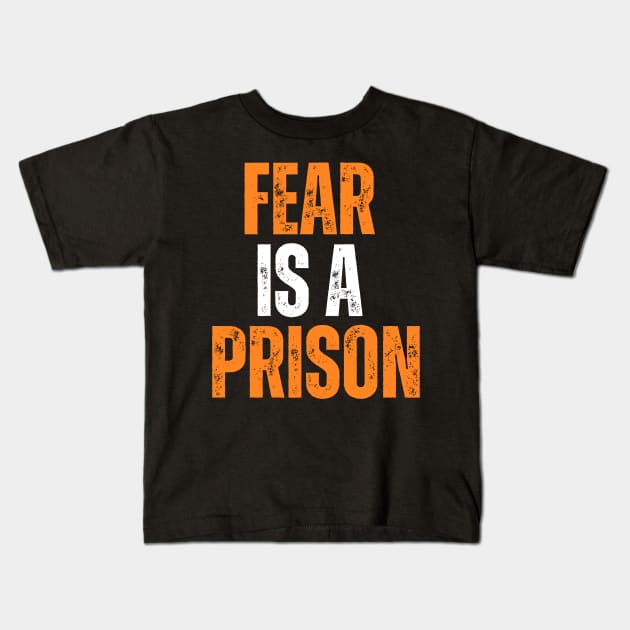 fear is a prison motivational quote typography design Kids T-Shirt by emofix